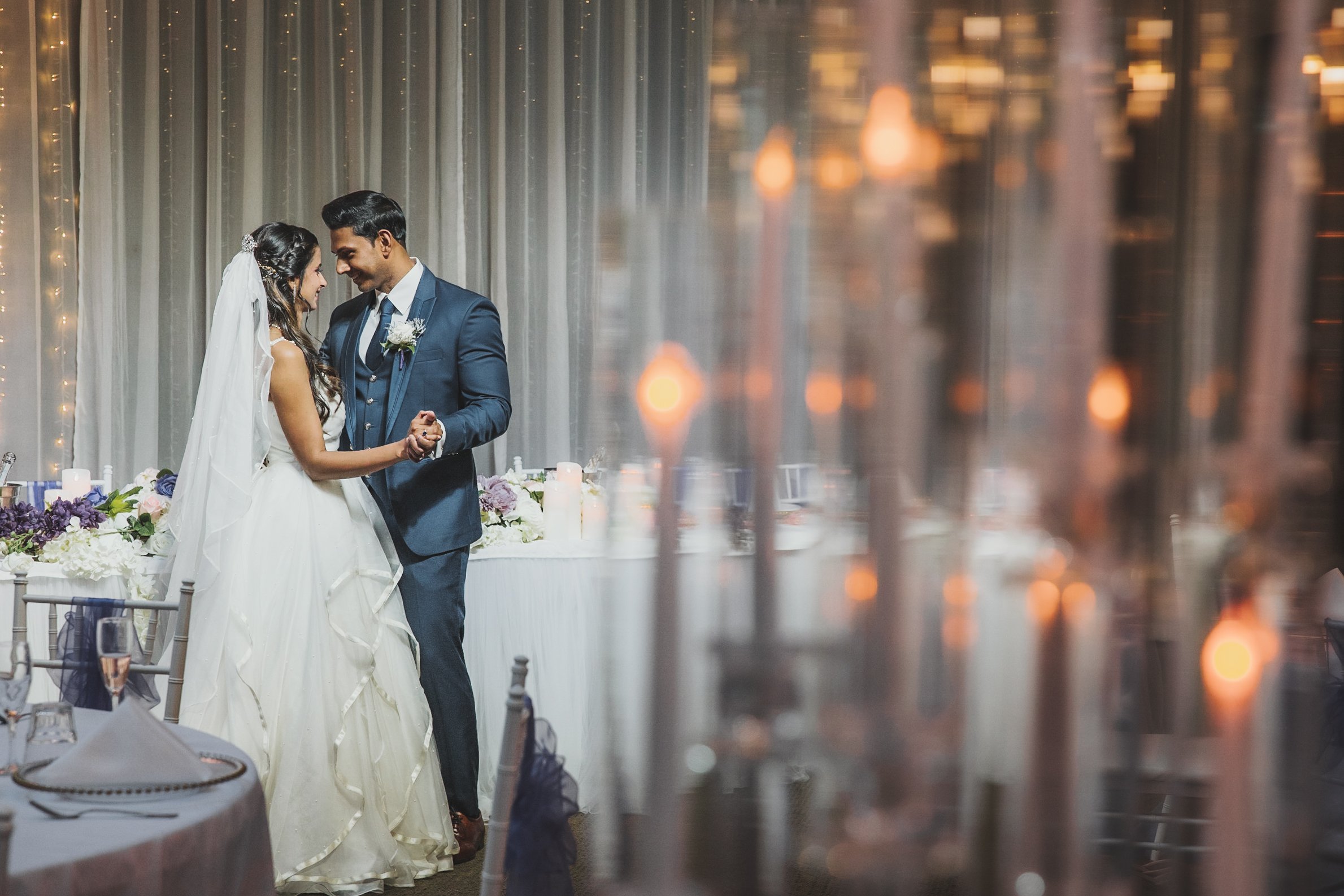Warm reception light at an Auckland wedding, graded with SuperGibo LUTs