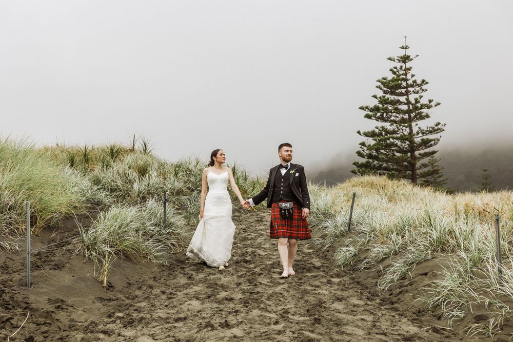 Muriwai beach wedding photos in the rain