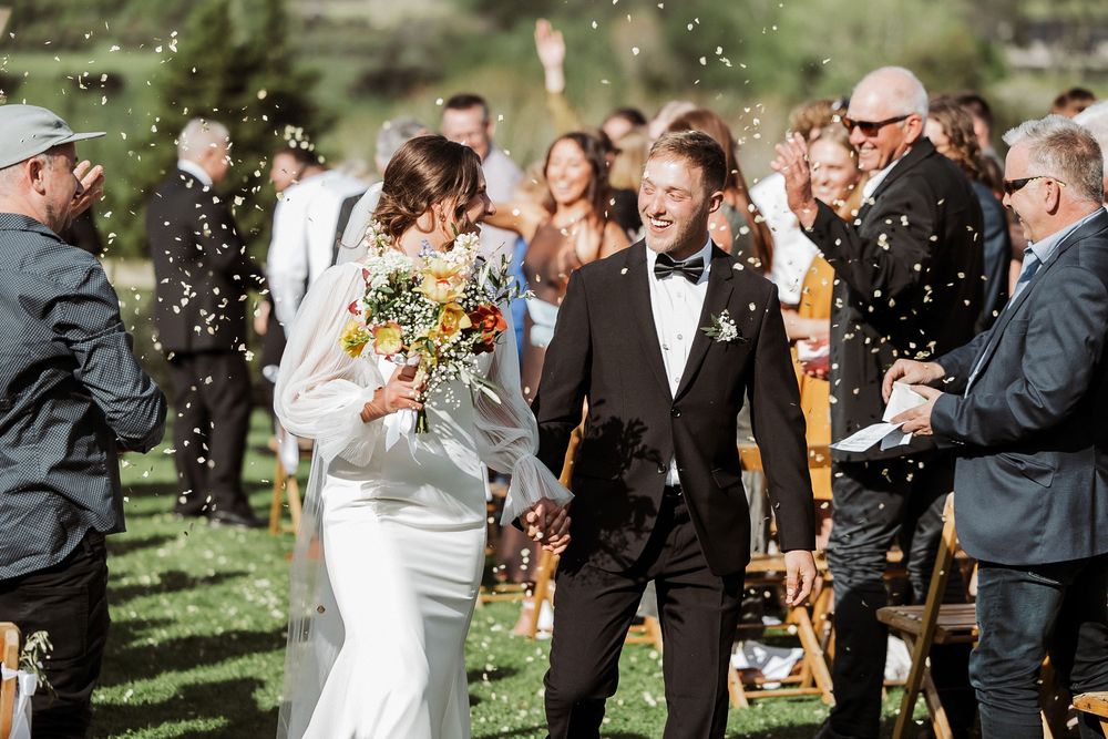 Confetti exit at Auckland garden wedding