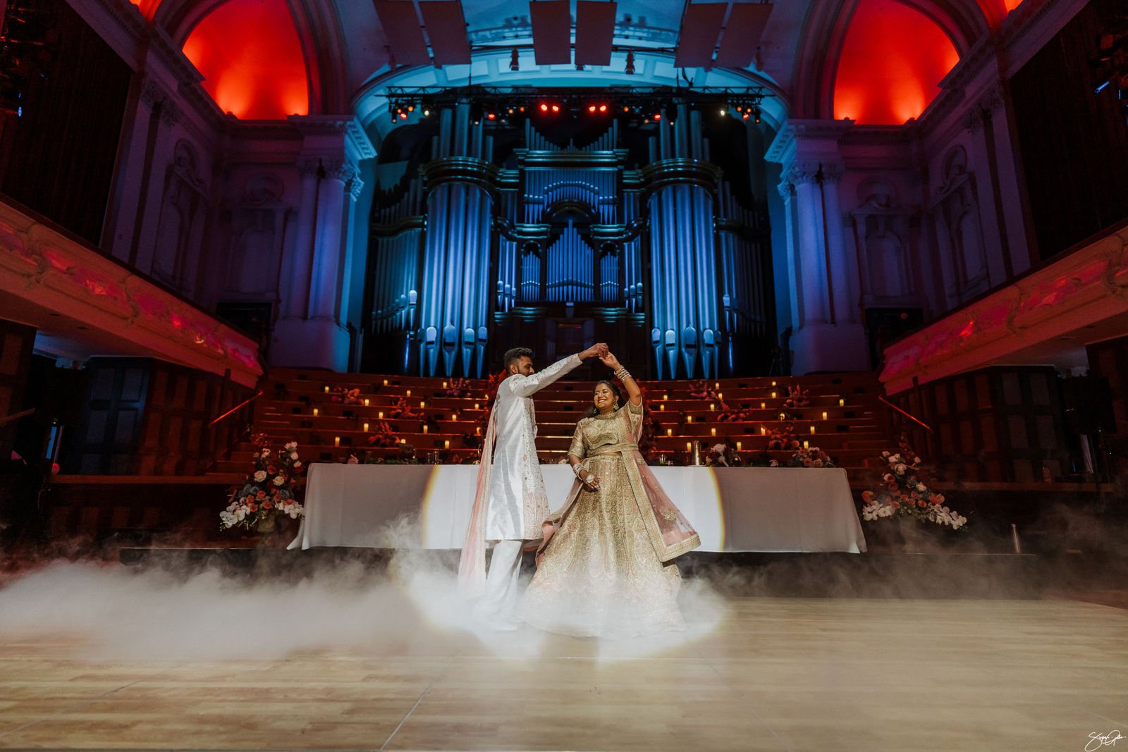 Indian wedding first dance on stage at Auckland Town Hall