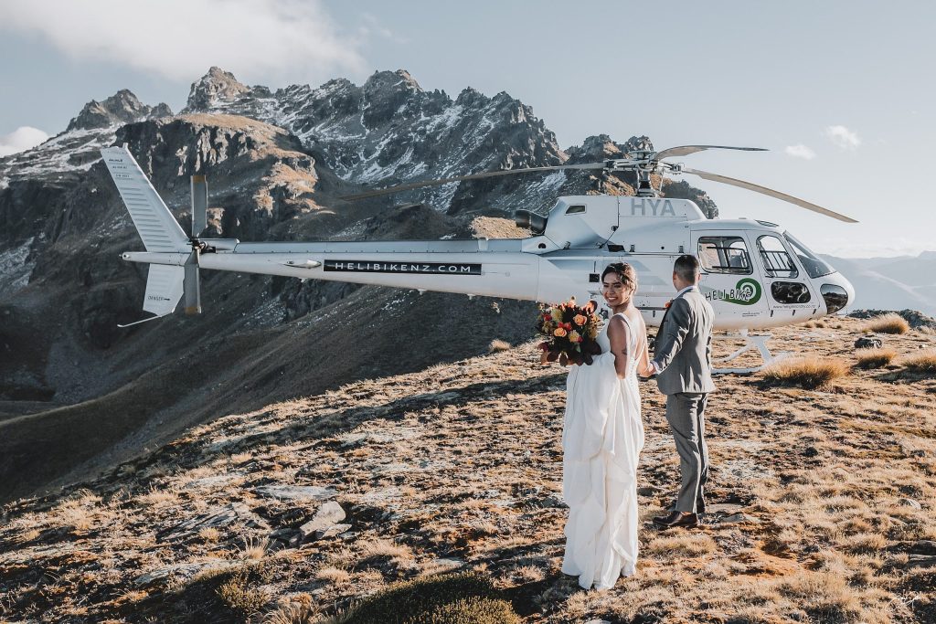Wedding couple on the Roys Peak ridge line at sunset, Central Otago