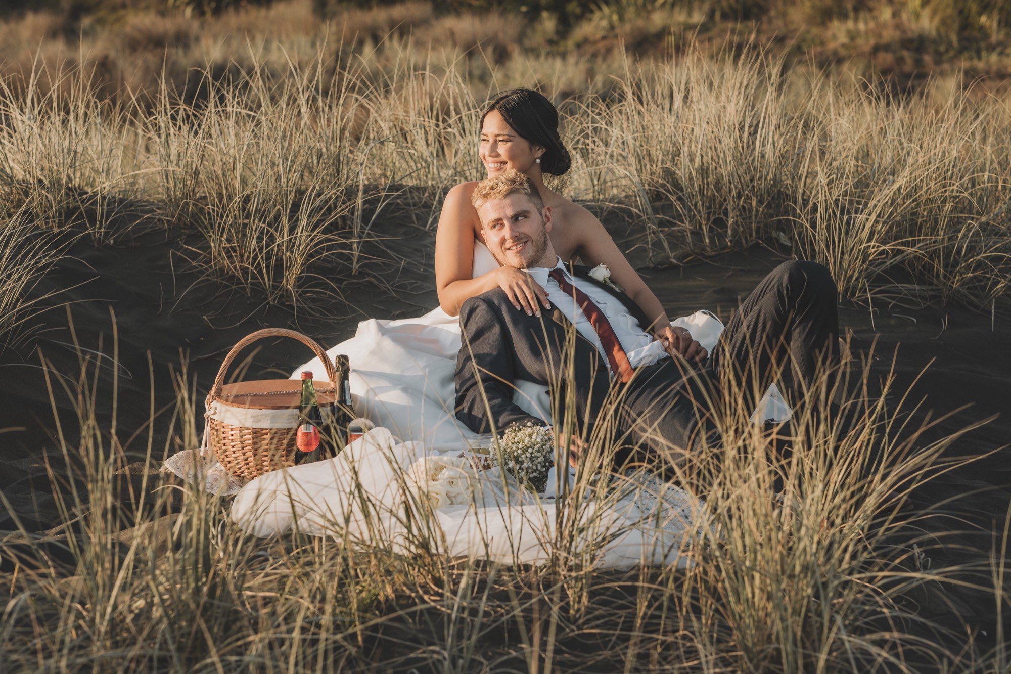 Elopement picnic in the black-sand dunes at Castaways